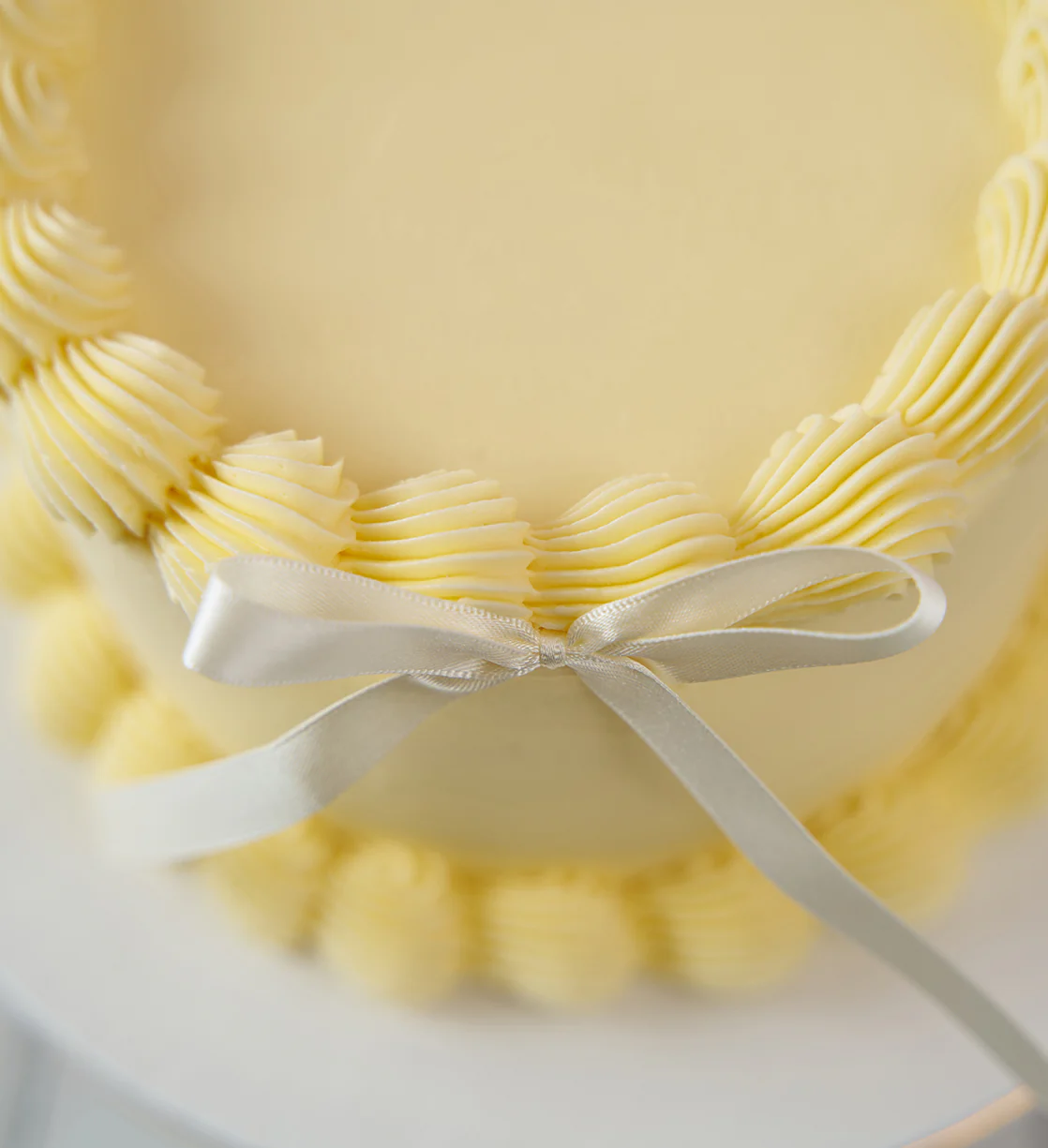 Gluten Free White Ribbons and Ruffles Cake - Image 6
