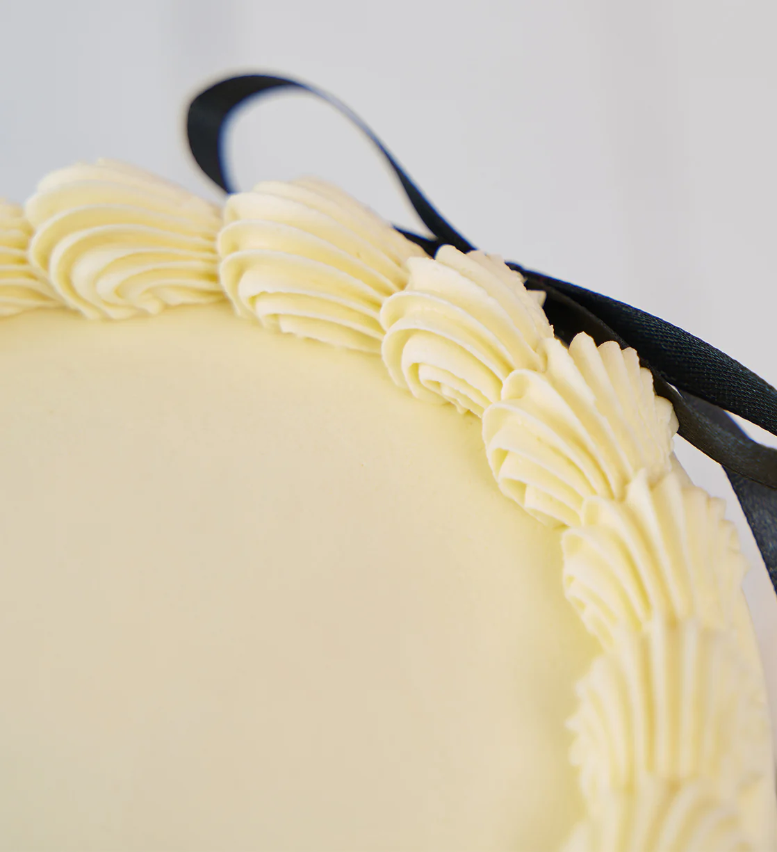 White and Black Ribbons and Ruffles Cake - Image 7