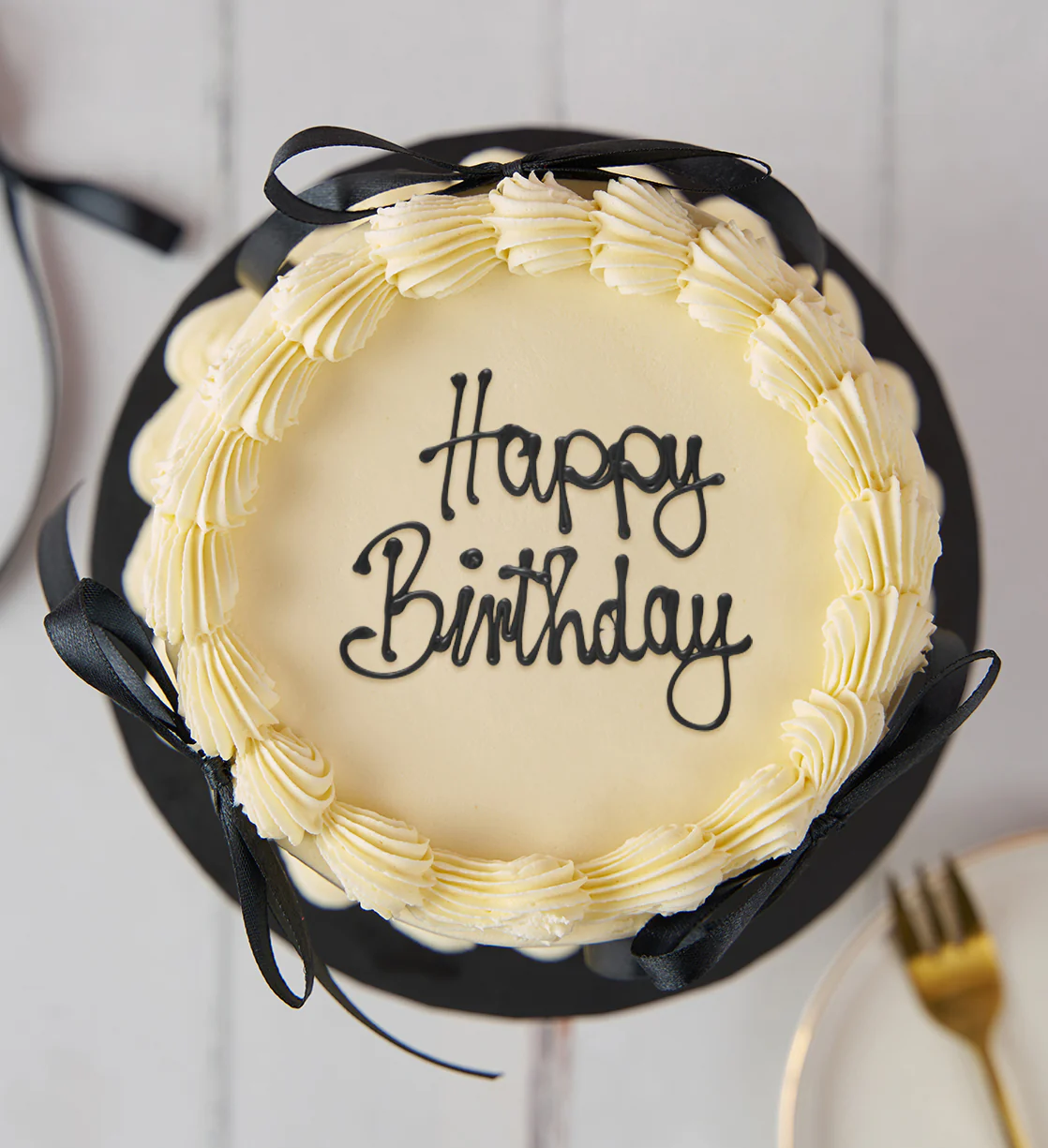 White and Black Ribbons and Ruffles Cake - Image 4