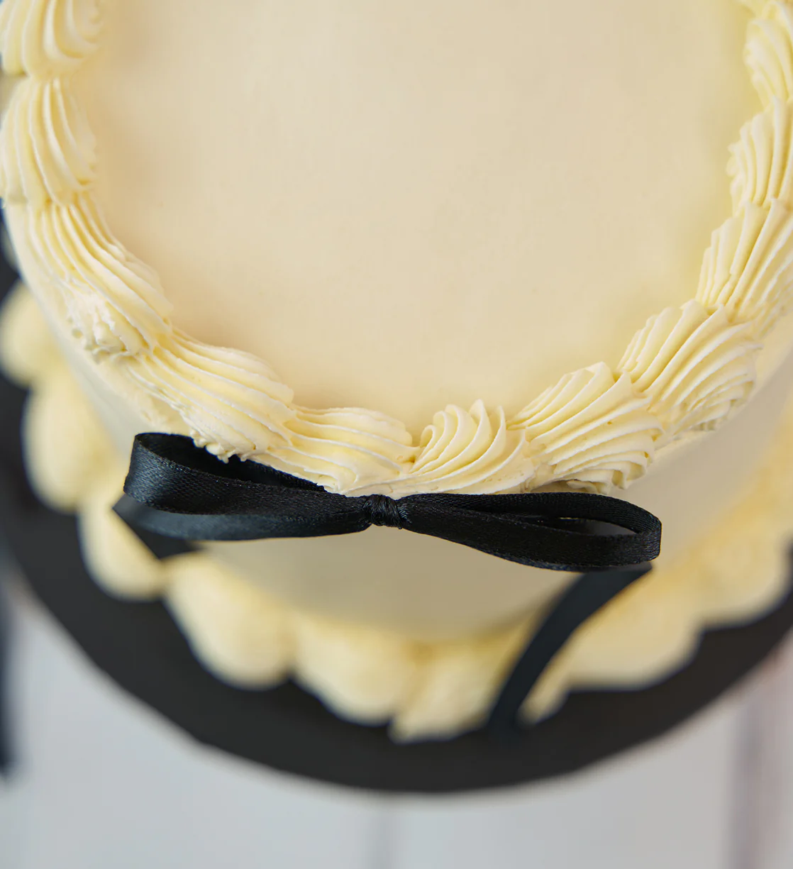 White and Black Ribbons and Ruffles Cake - Image 8