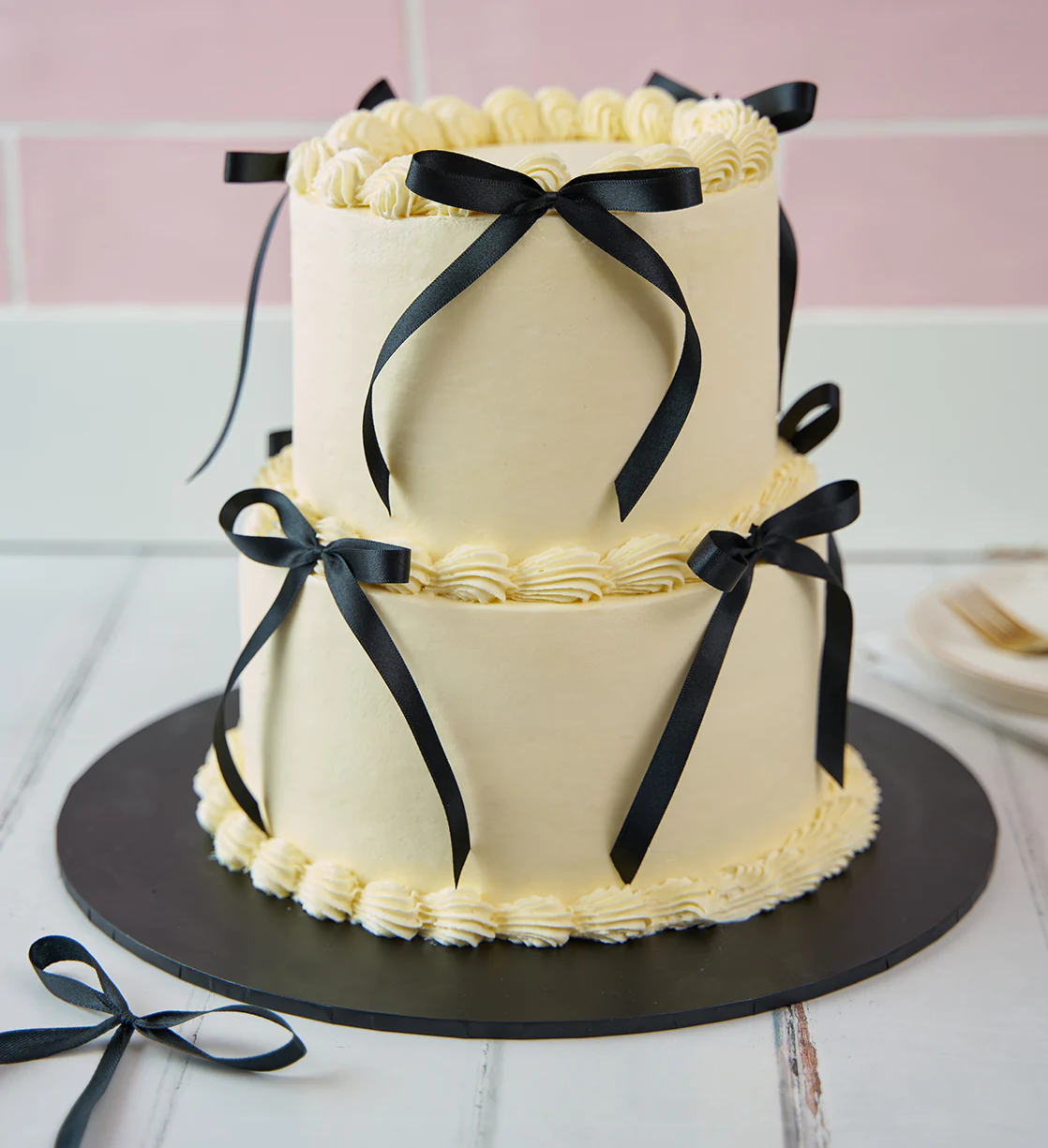 White and Black Ribbons and Ruffles Cake - Image 9